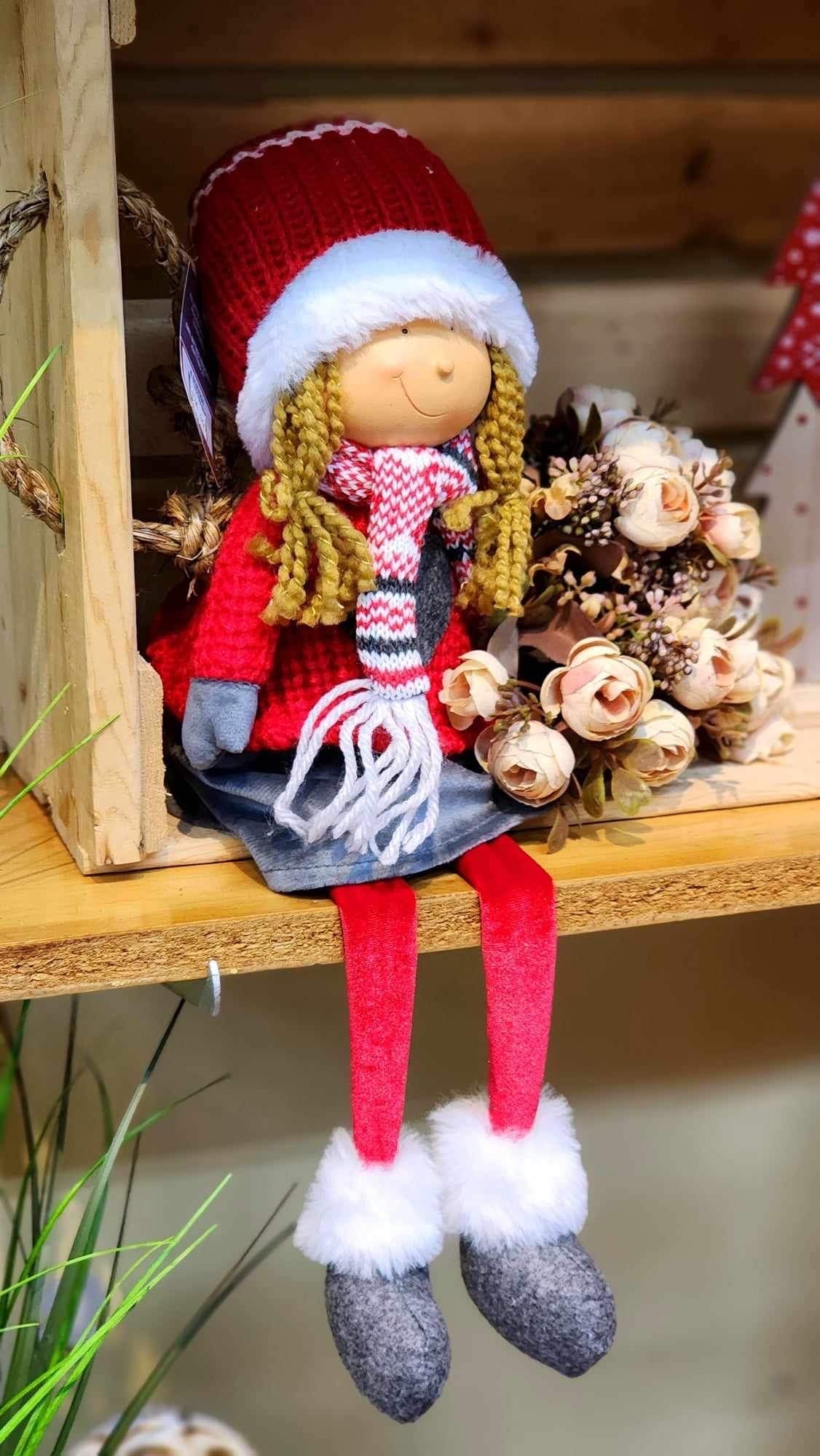 Personnage de noël assise